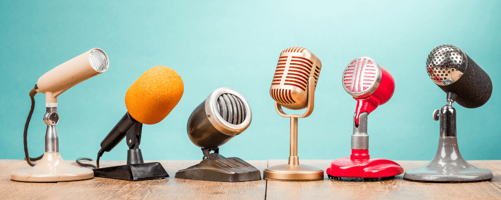 Assortment of speakers in blue backdrop 