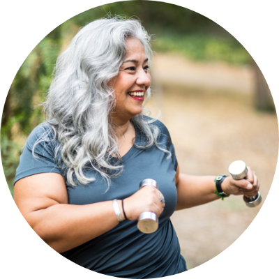 woman using dumbells